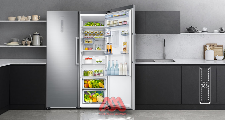 Technician repairing a Samsung refrigerator in Harare.